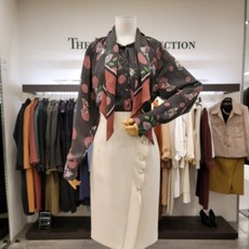 [더아이잗컬렉션(THEIZZATCOLLECTION)] 펄 장식 사선 러플 스커트(CJAA0