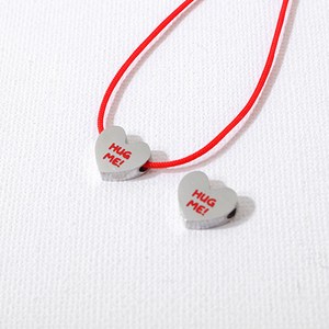 비즈아이 [8-046-10]써지컬스틸 펜던트 허그미하트통과형 10x8.5mm 1개