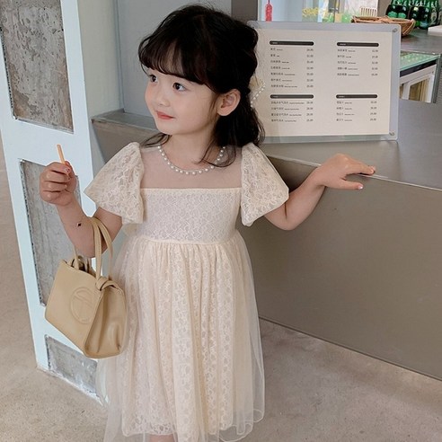Elevate Your Little One's Style with the Enchanting Junior Performance Dress