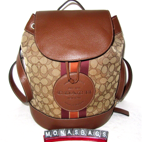 코치 CE601 뎀시 드로스트링 백팩 카키 시그니처 새들 레더 크로스백 미니