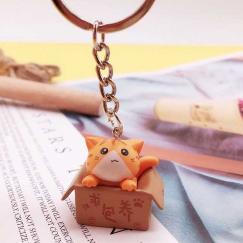 마음을 사로잡는 사랑스러움, 고양이 박스 캐릭터 키링으로 일상에 행복을 더하세요.